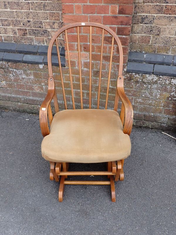 A HOOP-BACKED BENTWOOD ROCKING ARMCHAIR