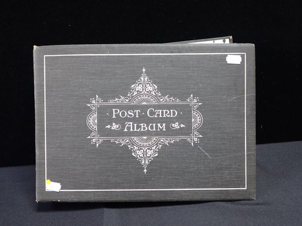 AN EDWARDIAN POSTCARD ALBUM