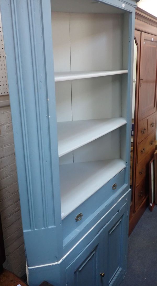 A GEORGE III TWO-SECTION PINE CORNER CUPBOARD