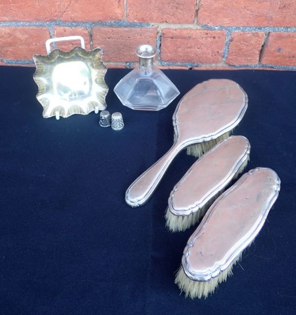 A CONTINENTAL SILVER DRESSING TABLE BRUSH SET