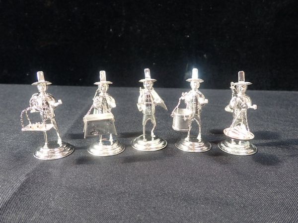 FIVE CHINESE SILVER FIGURES