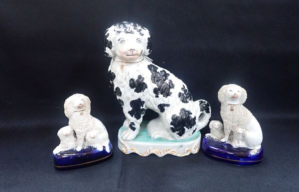 TWO SIMILAR STAFFORDSHIRE POODLE  ORNAMENTS