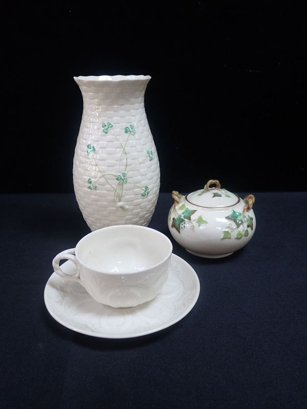 A BELLEEK FIRST PERIOD PORCELAIN INSTITUTE PATTERN CUP AND SAUCER