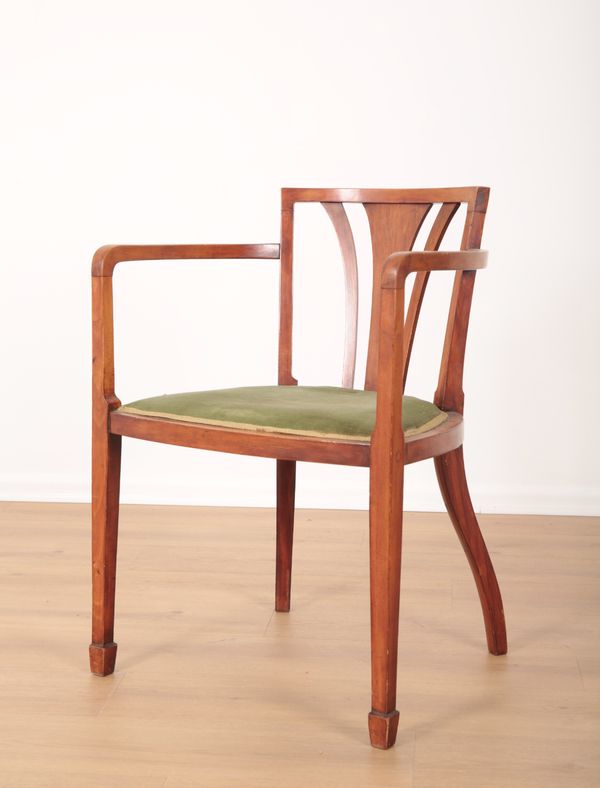 AN ARTS AND CRAFTS STAINED WOOD ARMCHAIR