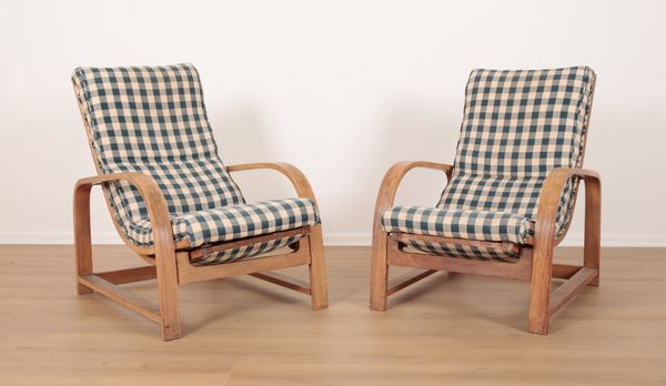 A PAIR OF ART DECO STYLE EASY ARMCHAIRS