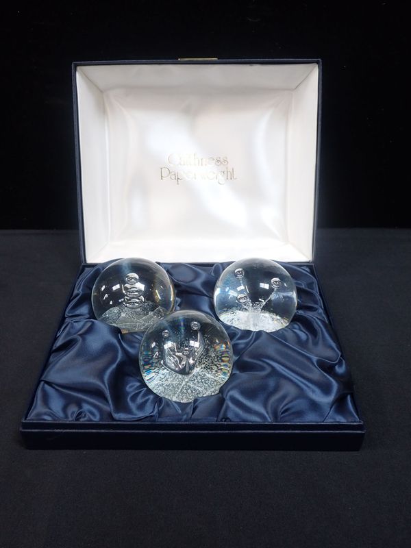 A BOXED SET OF THREE CAITHNESS PAPERWEIGHTS