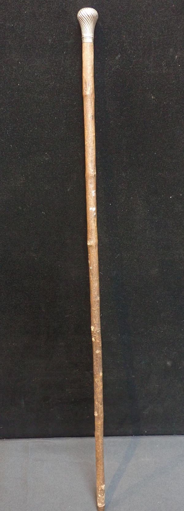 A VICTORIAN SILVER TOPPED CANE