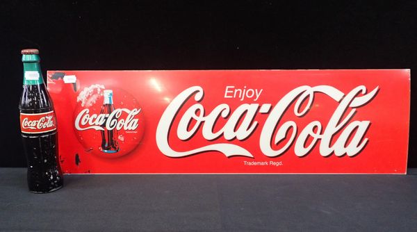 A COCA-COLA ADVERTISING BOTTLE-SHAPED FRIDGE HANDLE