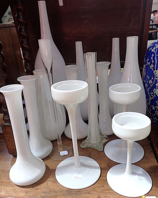 THREE GRADUATED MODERN WHITE GLASS CANDLESTICKS