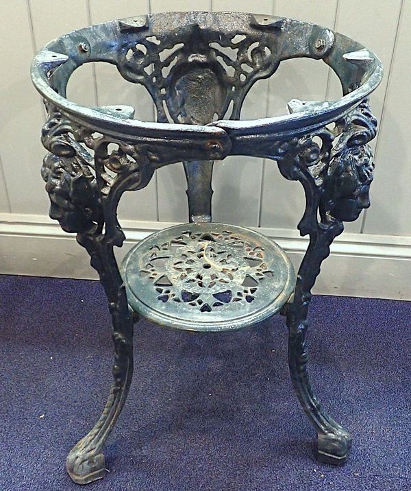 A CAST IRON ROUND GARDEN OR PUB TABLE BASE