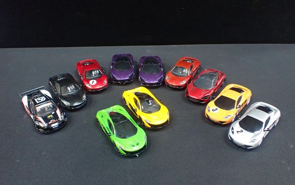 ELEVEN UNBOXED SCALEXTRIC 'McLAREN' CARS