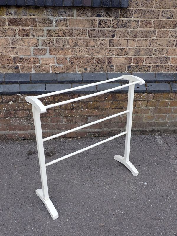 AN EDWARDIAN WHITE PAINTED TOWEL AIRER