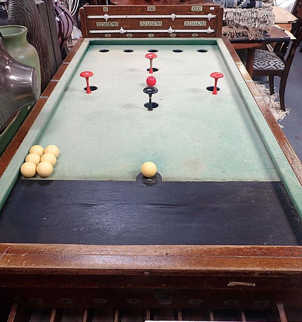 A VINTAGE OAK-FRAMED BAR BILLIARD TABLE