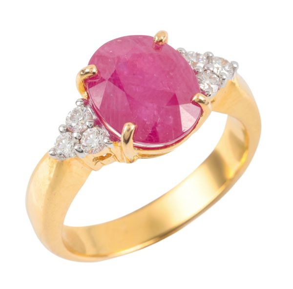 A SYNTHETIC RUBY AND DIAMOND RING