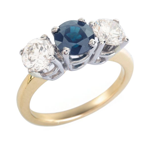 A SAPPHIRE AND DIAMOND THREE STONE RING