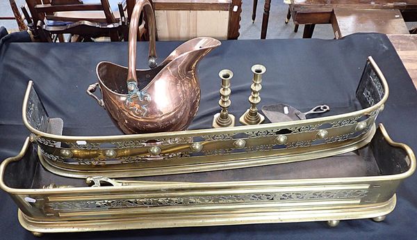 A 19th CENTURY BRASS FENDER