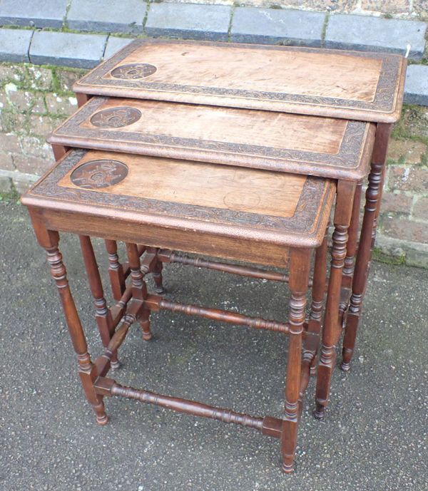 A NEST OF THREE INDIAN HARDWOOD TABLES, WITH THE INSIGNIA OF THE SHERWOOD FORESTERS