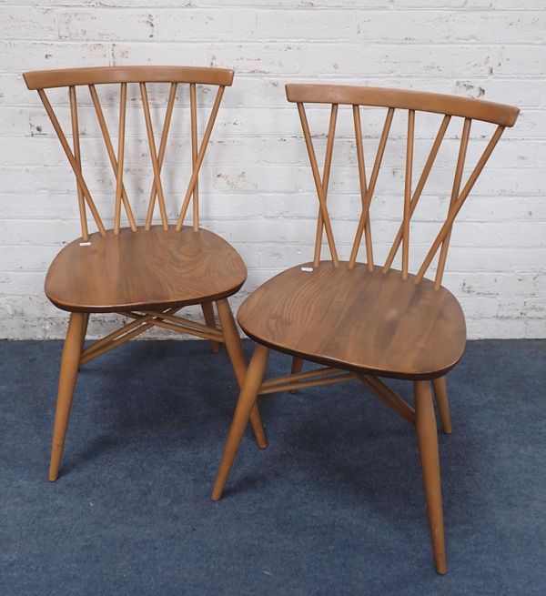 A PAIR OF BLOND ERCOL 376 'CANDLESTICK' CHAIRS