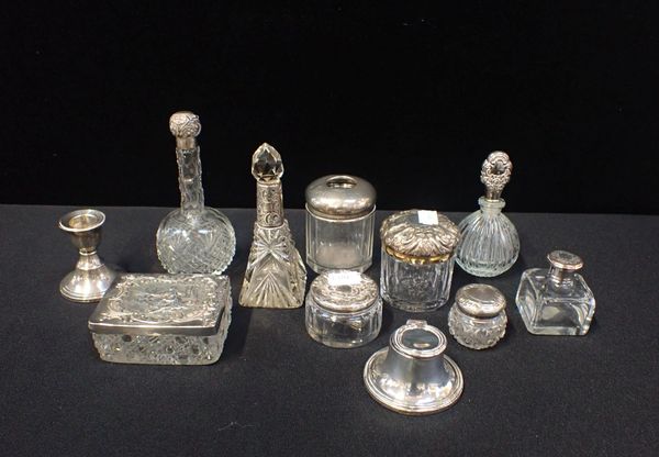 A QUANTITY OF SILVER TOPPED DRESSING TABLE JARS