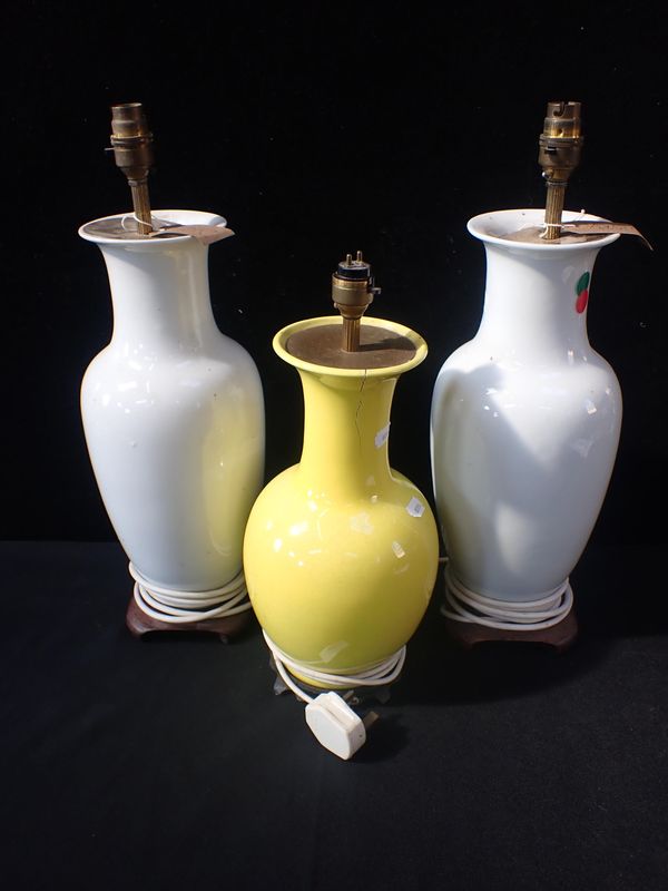 A PAIR OF WHITE-GLAZED PORCELAIN TABLE LAMPS