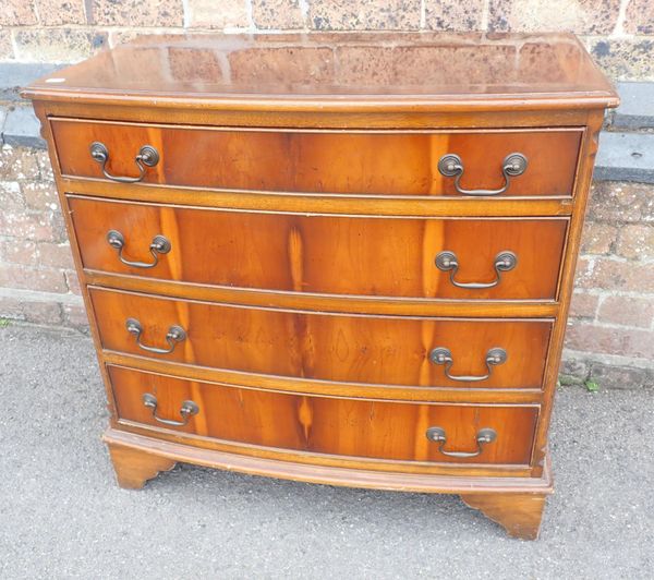 A SMALL YEW-WOOD BOWFRONT CHEST OF DRAWERS