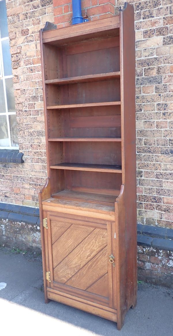 A TALL 19th CENTURY GOTHIC REVIVAL WALNUT BOOKCASE