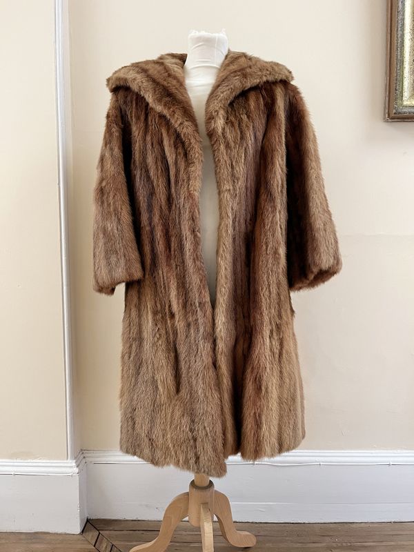 A LADIES FUR COAT