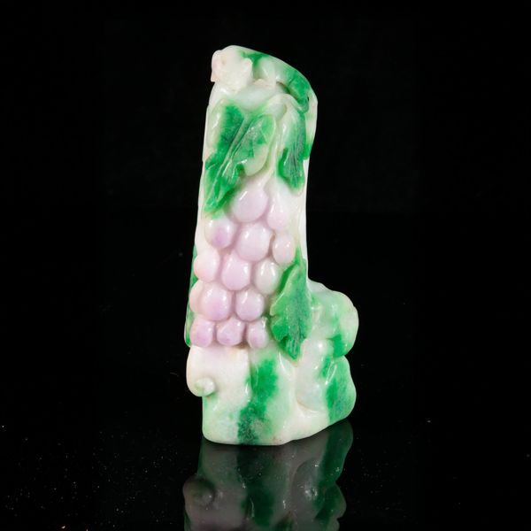 A CHINESE CARVED JADE 'SQUIRREL AND GRAPES' MOUNTAIN