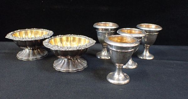 A PAIR OF LARGE SILVER PLATE SALTS