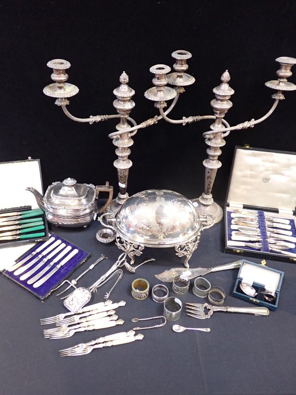 A LARGE PAIR OF SILVER-PLATED CANDELABRA