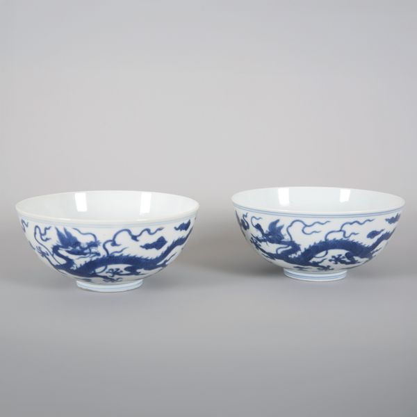 A PAIR OF CHINESE PORCELAIN BLUE AND WHITE DRAGON BOWLS