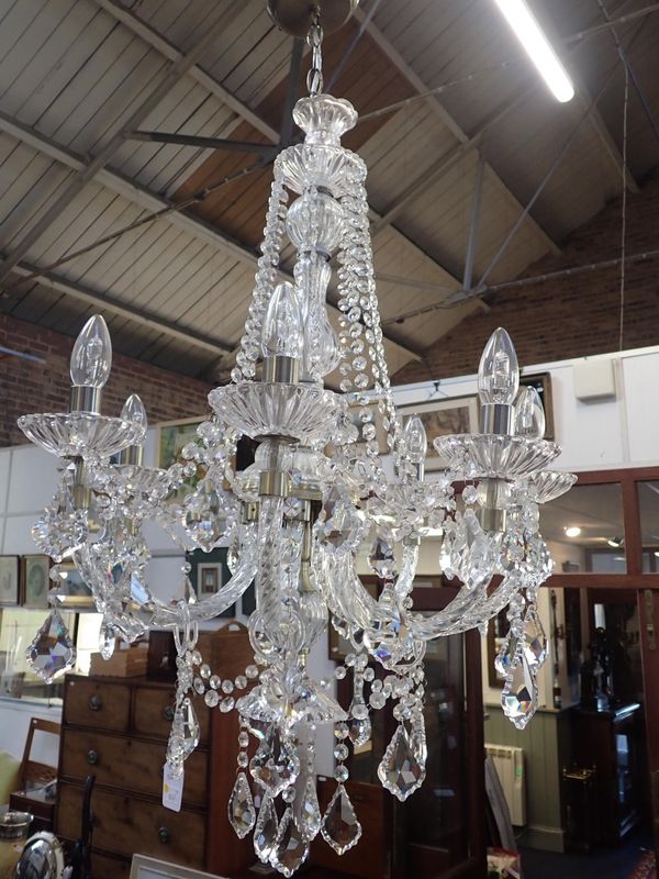 A  SEVEN-BRANCH CHANDELIER WITH PRISMATIC DROPS