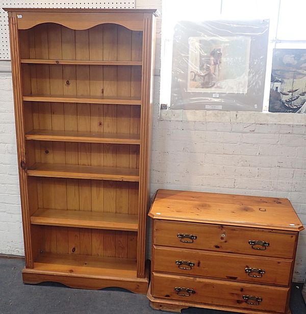 A MODERN PINE OPEN BOOKCASE