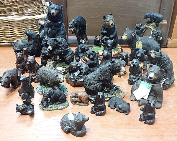 A COLLECTION OF RESIN CAST BLACK BEAR FIGURES