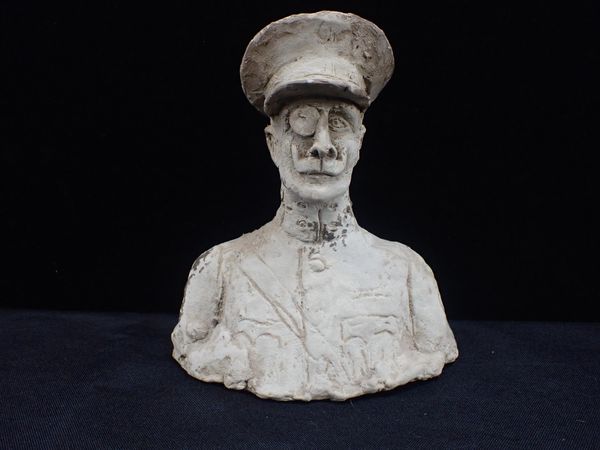 A PLASTER MAQUETTE CARICATURE BUST