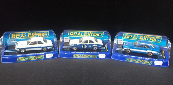 THREE BOXED SCALEXTRIC 'FORD ESCORT MK1' CARS