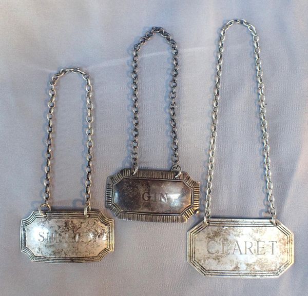 THREE SILVER DECANTER LABELS
