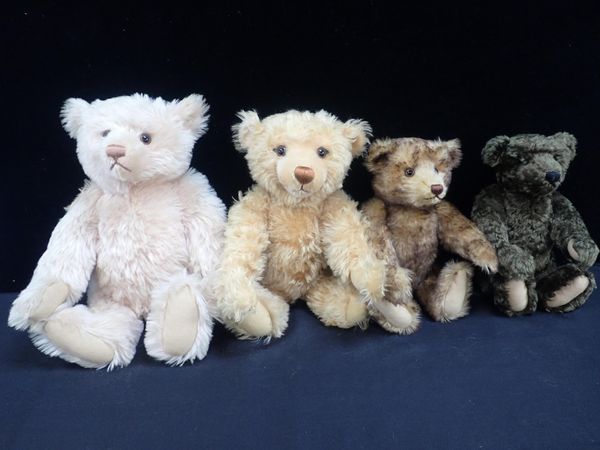 A PALE PINK MODERN STEIFF BEAR, AND THREE OTHERS