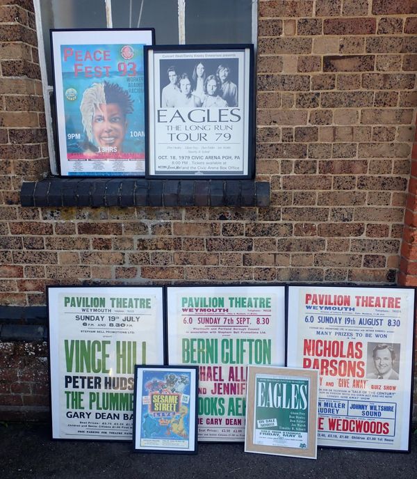 A COLLECTION OF FRAMED POSTERS