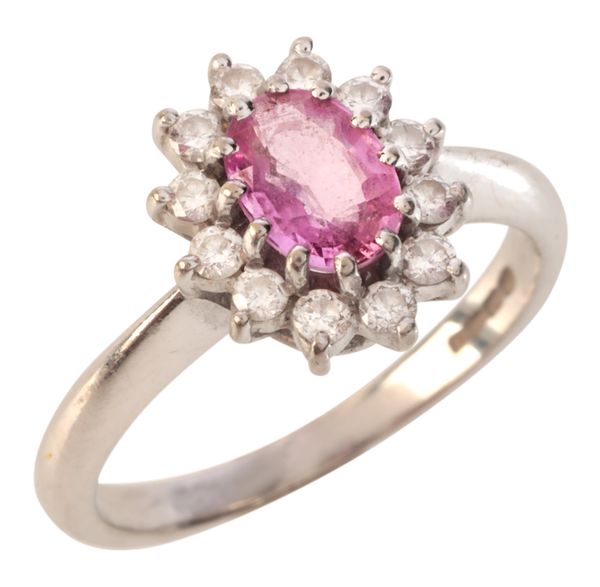 A PINK SAPPHIRE AND DIAMOND CLUSTER RING