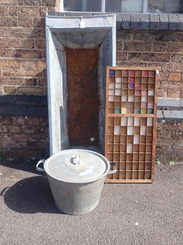 A GALVANISED ANIMAL TROUGH