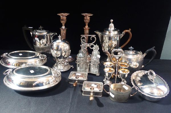 A PAIR OF SILVER PLATED CANDLE STICKS