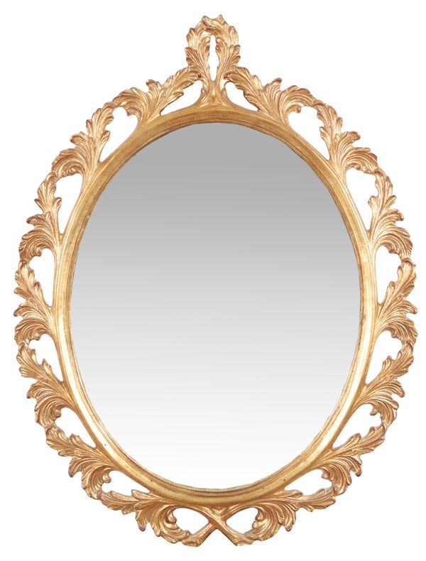 A GILTWOOD OVAL MIRROR