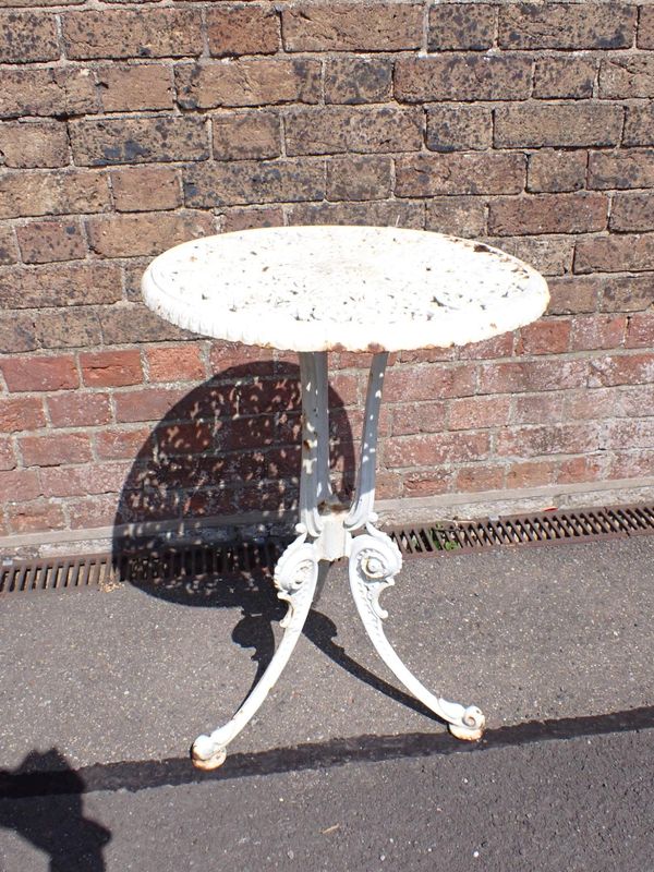 A VICTORIAN CAST IRON GARDEN TABLE
