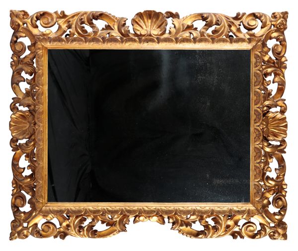 A CARVED GILTWOOD AND GESSO MIRROR