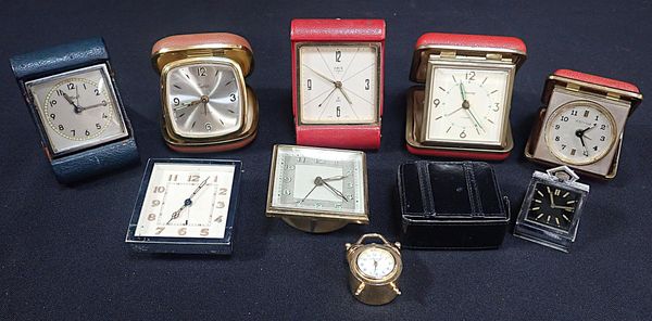 AN ORIS LEATHER & BRASS TRAVELLING CLOCK