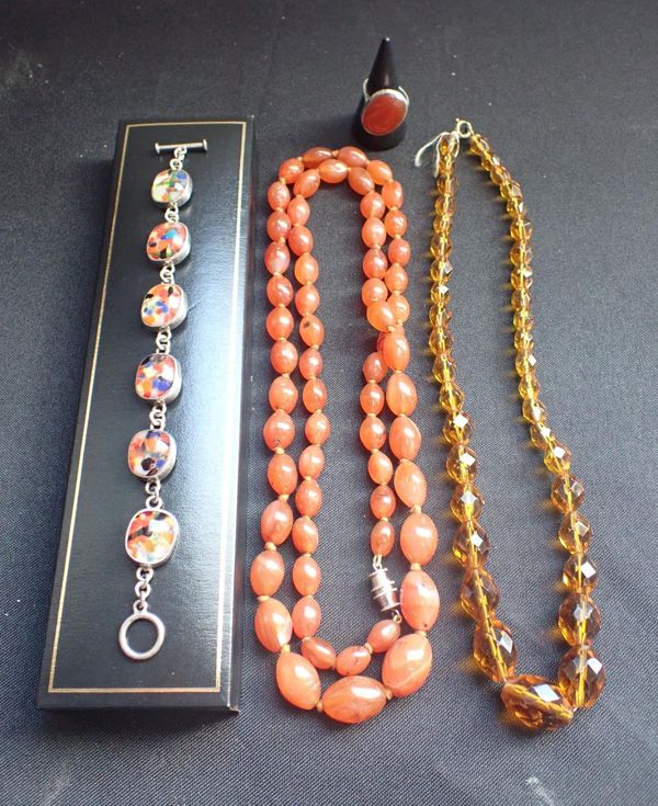 A CARNELIAN BEAD NECKLACE AND MATCHING RING