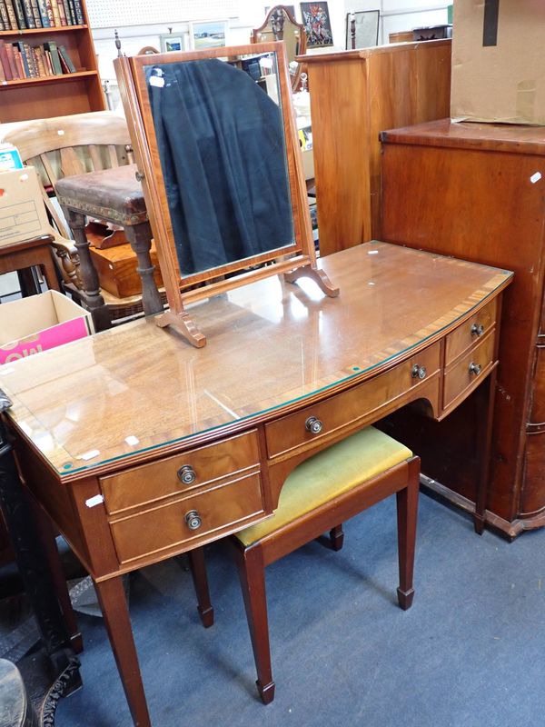 A GEORGE III STYLE MAHOGANY BOWFRONT DRESSING TABLE