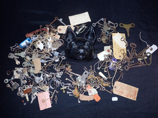 A CAST IRON FOX MASK DOOR STOP