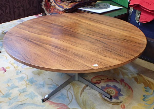 A MID CENTURY ROUND COFFEE TABLE